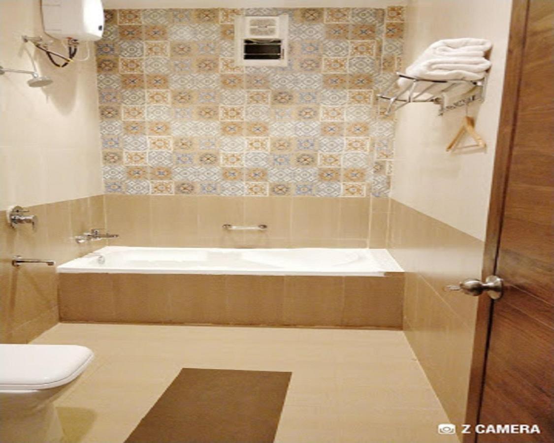 Exotica Beach Retreats Diveagar Bagian luar foto